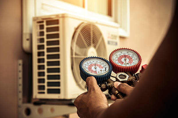 Professional Hvac Maintenance technician working in Arlington Heights, MA